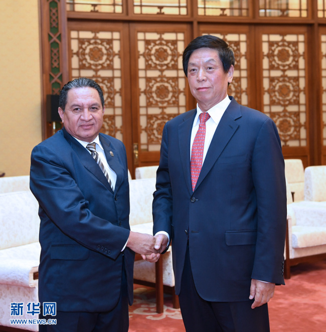 Li Zhanshu, chairman of the National People's Congress (NPC) Standing Committee, meets with Jose Serafin Orantes, the first vice president of the Legislative Assembly of El Salvador, in Beijing on April 15, 2019. [Photo: Xinhua]