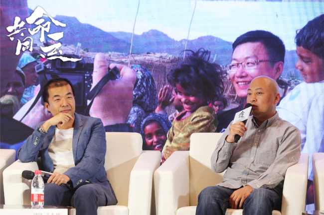 Director Deng Fei (left) and Qu Jiangtao (right) share behind-the-scene stories for the movie "Common Destiny" at a special session on Tuesday, April 16, 2019 as part of the ongoing Beijing International Film Festival.[Photo: China Plus]