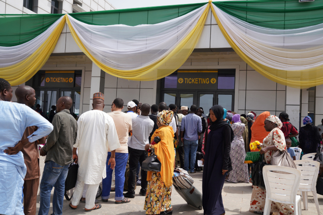 Passengers queue to buy train tickets for the Abuja-Kaduna rail line. [Photo provided to China Plus]