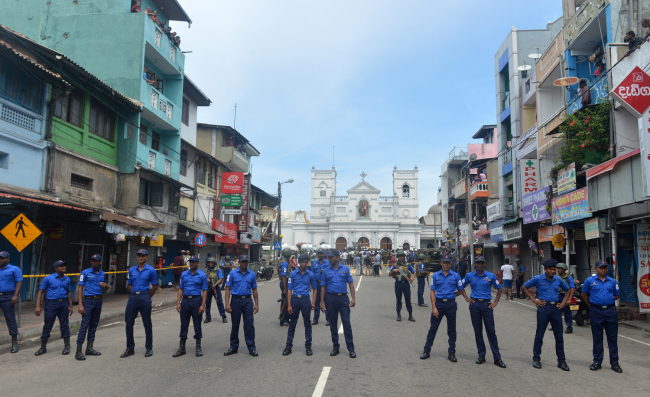 Sri Lankan security personnel keep watch outside the church premises following a blast at the St. Anthony's Shrine in Kochchikade, Colombo on April 21, 2019. [Photo: AFP]