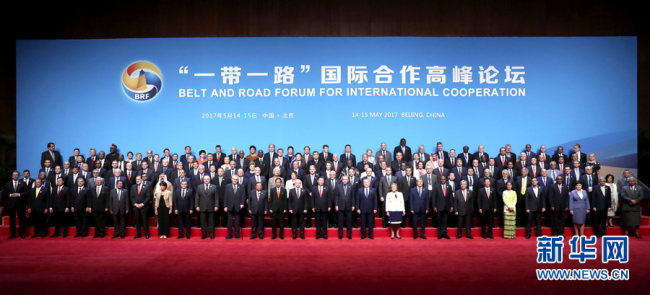 President Xi Jinping poses for pictures with participants attending the first Belt and Road Forum for International Cooperation, Beijing, May 14, 2017. [Photo: Xinhua]