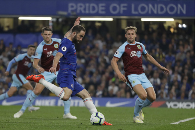 Chelsea's Gonzalo Higuain scores his side's second goal during the English Premier League soccer match between Chelsea and Burnley in London on April 22, 2019. [Photo: AP]