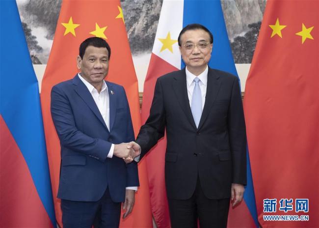 Premier Li Keqiang (R) meets with Philippine President Rodrigo Duterte in Beijing, on Thursday, April 25, 2019. [Photo: Xinhua]