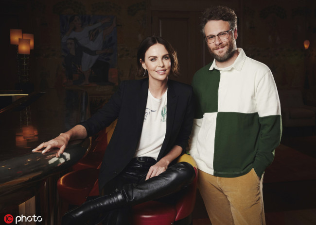 Co-stars Charlize Theron, left, and Seth Rogen pose for a portrait in New York to promote their film "Long Shot" on April 29, 2019. [Photo:IC]