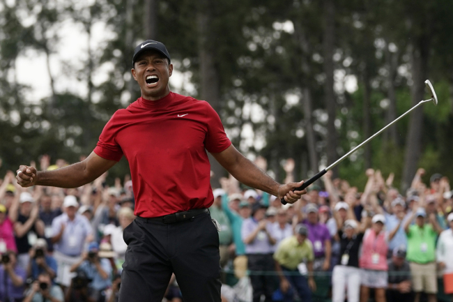 Tiger Woods reacts as he wins the Masters golf tournament Sunday, April 14, 2019, in Augusta, Ga. [Photo: AP]