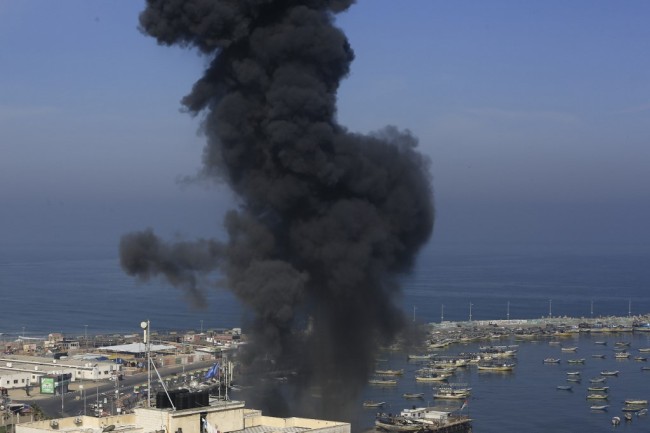 Smoke billows in the area overlooking Gaza City's main port during an Israeli airstrike on the Hamas-run Palestinian enclave on May 5, 2019. [Photo: AFP/Mohammed Abed] 