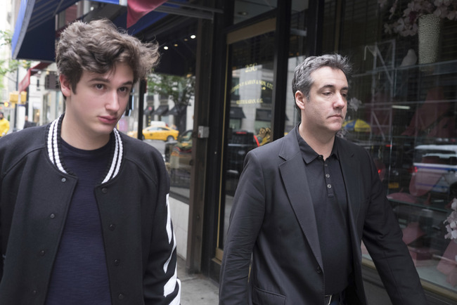 Michael Cohen, right, President Donald Trump's former personal attorney, walks down the street with his son Jake after leaving his apartment, Saturday, May 4, 2019, in New York. Cohen is scheduled to report to a federal prison on Monday, May 6, to begin serving a three-year sentence for campaign-finance violations, tax evasion, bank fraud, and lying to Congress. [Photo: AP]