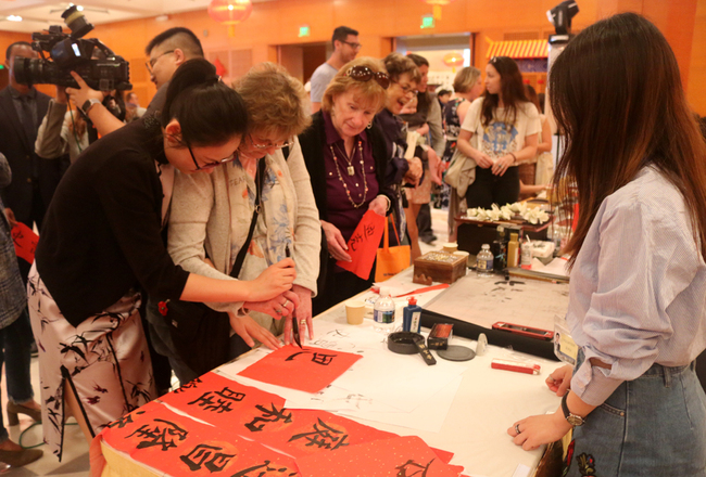 Visitors experience the traditional Chinese culture at the open house event of the Chinese embassy in the U.S. on May 4, 2019. [Photo: China Plus]