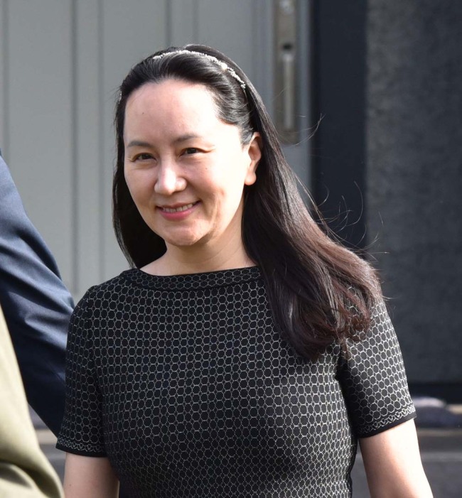 Huawei Chief Financial Officer, Meng Wanzhou, leaves her residence to attend British Columbia Supreme Court, in Vancouver, on May 8, 2019. [Photo: AFP]