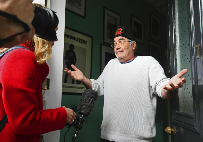 Danny Baker speaks to the media at his London home on May 9, 2019. [Photo: PA via AP/Victoria Jones]
