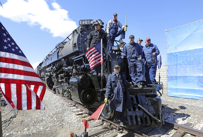 The crew from the Big Boy, No. 4014 pose for a photograph during the commemoration of the 150th anniversary of the Transcontinental Railroad completion at Union Station Thursday, May 9, 2019, in Ogden, Utah. [Photo: AP/Rick Bowmer]