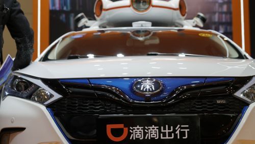 Undated photo shows the self-driving car model made by Didi Chuxing and BYD being exhibited at the Global AI Product Application Expo in Suzhou, Jiangsu Province. [Photo: TechWeb]