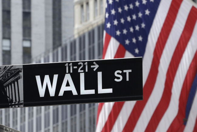 A Wall Street sign near the New York Stock Exchange on July 6, 2015. [File photo: IC] 