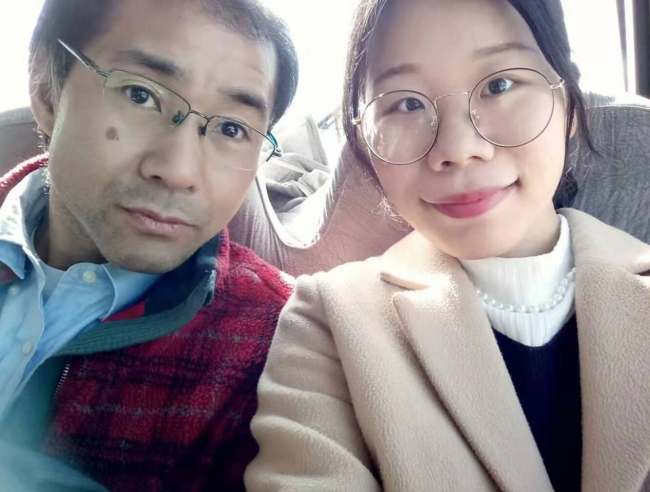 Mori Masatsugu (L) poses for a selfie with his wife, a Beijing local, on March 7, 2019. [File Photo provided for China Plus]