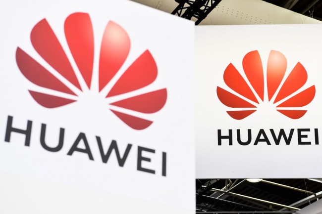 Logos of the Chinese telecome group Huawei is displayed during the Vivatech startups and innovation fair in Paris on May 16, 2019. [Photo: AFP]