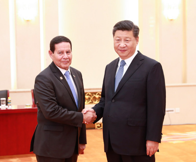 Chinese President Xi Jinping meets with Brazilian Vice President Hamilton Mourao at the Great Hall of the People in Beijing on May 24, 2019. [Photo: Xinhua]