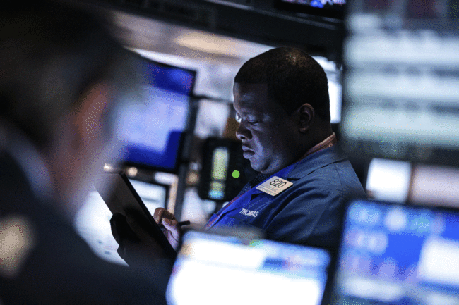 Traders at work on the floor of the New York Stock Exchange, May 13, 2019. [Photo: IC]