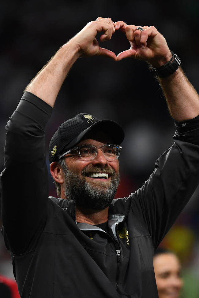 Liverpool's German coach Jurgen Klopp signs a heart with his hands after winning the UEFA Champions League final football match between Liverpool and Tottenham Hotspur at the Wanda Metropolitano Stadium in Madrid on June 1, 2019. [Photo: AFP]