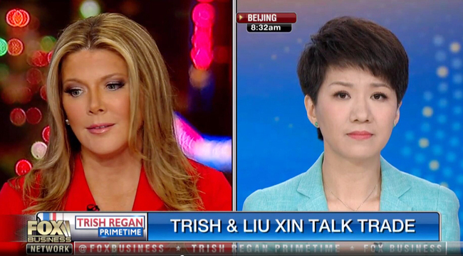 CGTN anchor Liu Xin (right) and Fox Business Network host Trish Regan faced off live on Regan's primetime show on May 30, 2019. [Photo: IC]