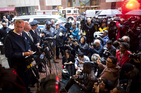 New York City mayor Bill de Blasio addresses the media after a helicopter crash-landed on top of a high-rise in midtown Manhattan in New York on June 10, 2019. The crash started a fire and left one person dead as the entire building shook from the impact. [Photo: AFP]