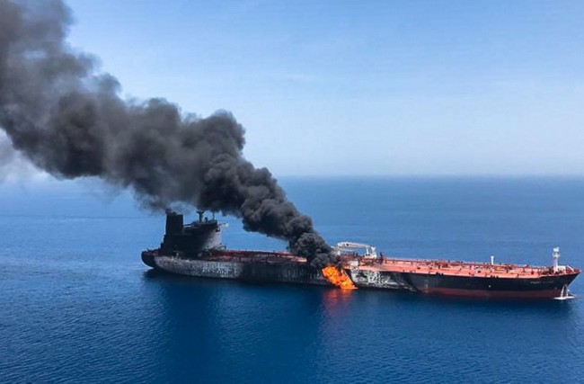 A picture obtained from Iranian News Agency ISNA on June 13, 2019 reportedly shows fire and smoke billowing from Norwegian owned Front Altair tanker said to have been attacked in the waters of the Gulf of Oman. [Photo: AFP]