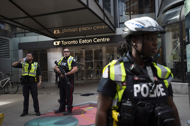 Toronto Police secure the scene where shots were fired during the Toronto Raptors NBA basketball championship parade in Toronto, Monday, June 17, 2019. [Photo: IC]