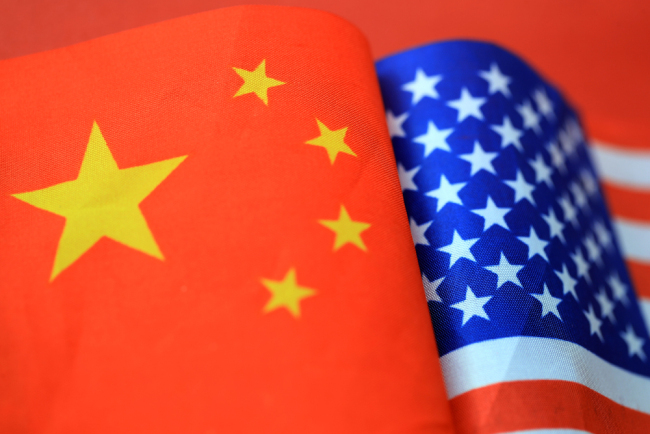 National flags of China and the United States. [File photo: IC]