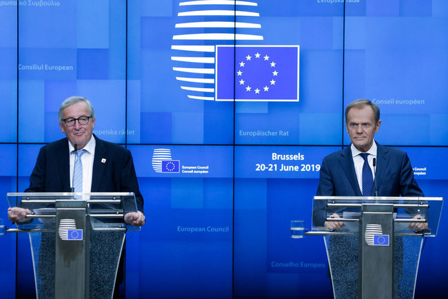 President of the European Commission Jean-Claude Juncker and the President of the European Council Donald Tusk give a press conference after the first day of the European Summit where the future of the Presidency of the Commission and the Council were discussed in Brussels, on June 21, 2019. [Photo: AFP/Aris Oikonomou]