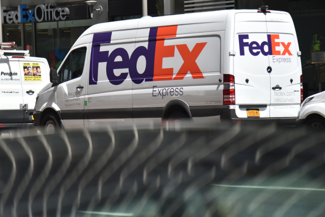 File photo of a FedEx truck on 3rd Avenue in New York City. [Photo: AFP]