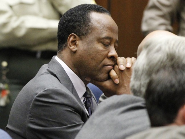 Dr. Conrad Murray closes his eyes after he was sentenced to four years in county jail for his involuntary manslaughter conviction of pop star Michael Jackson in Los Angeles, CA on November 29, 2011. [Photo: AFP/ Mario Anzuoni]