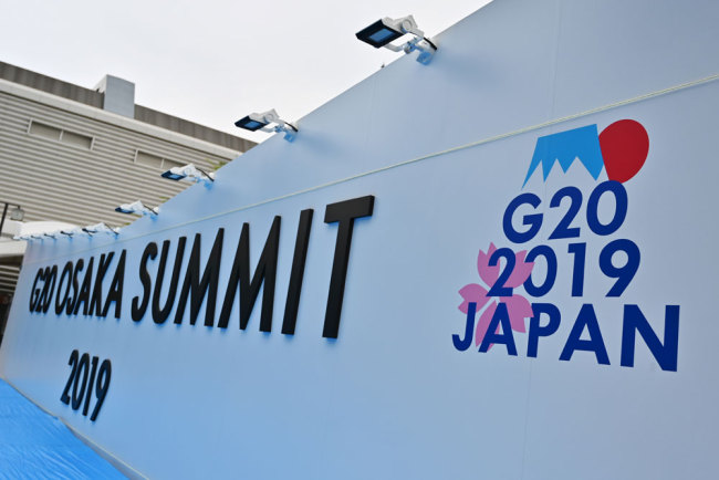 A stage set up for participants is pictured at the venue for the G20 Osaka Summit in Osaka on June 26, 2019, ahead of the start of the gathering of world leaders later this week. [Photo: AFP/Charly Triballeau]