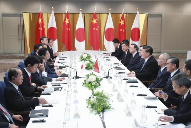 Chinese President Xi Jinping hosts talk with Japanese Prime Minister Shinzo Abe in Osaka, Japan, June 27, 2019. [Photo: Xinhua]