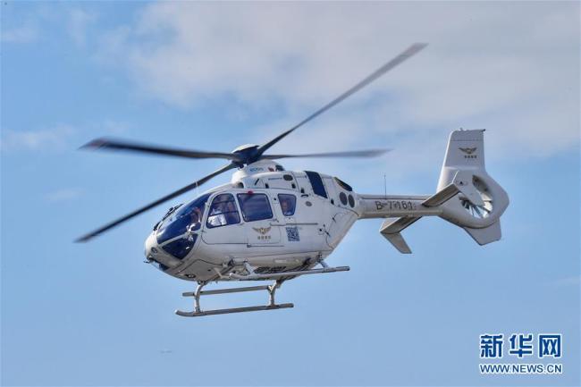 The first cross-border helicopter flight is conducted on June 28, 2019 between Shenzhen and Hong Kong Special Administrative Region. [Photo: Xinhua]