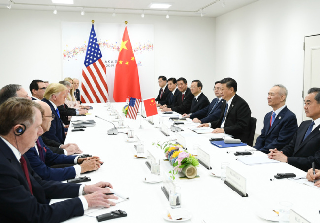 Chinese President Xi Jinping meets with U.S. President Donald Trump in Osaka, Japan, June 29, 2019. [Photo: Xinhua]