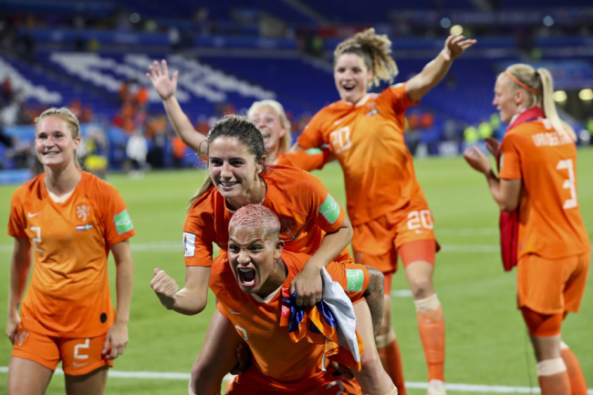 Dutch players celebrate after winning the Women's World Cup semifinal soccer match against Sweden at the Stade de Lyon outside Lyon, France, Wednesday, July 3, 2019. [Photo: IC]