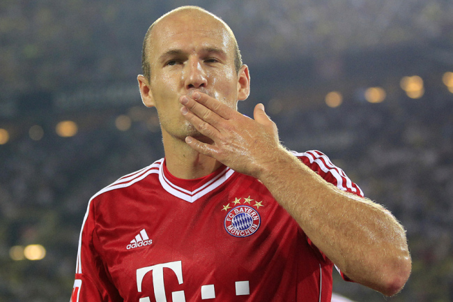 In this July 27, 2013, file photo, Bayern's Arjen Robben of the Netherlands reacts during the Super Cup final soccer match between Borussia Dortmund and Bayern Munich in Dortmund, Germany. [Photo: IC]