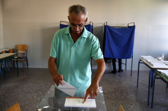 A man casts his ballot at a polling station in Athens, Greece, July 7, 2019. [Photo: IC]