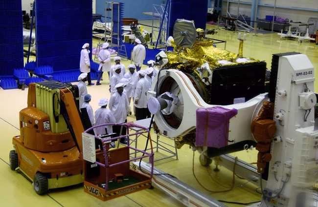 Indian Space Research Organisation (ISRO) scientists work on the orbiter vehicle of 'Chandrayaan-2', India's first moon lander and rover mission planned and developed by the ISRO, in Bangalore, India, June 12, 2019. [Photo: IC]