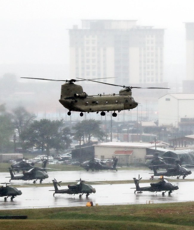 A Chinook chopper flies over the U.S. army base Camp Humphreys in Pyeongtaek, South Korea, 23 April 2018, on the first day of the two-week South Korea-US Key Resolve command-post exercise. [Photo: EPA/YONHAP SOUTH KOREA OUT via IC]