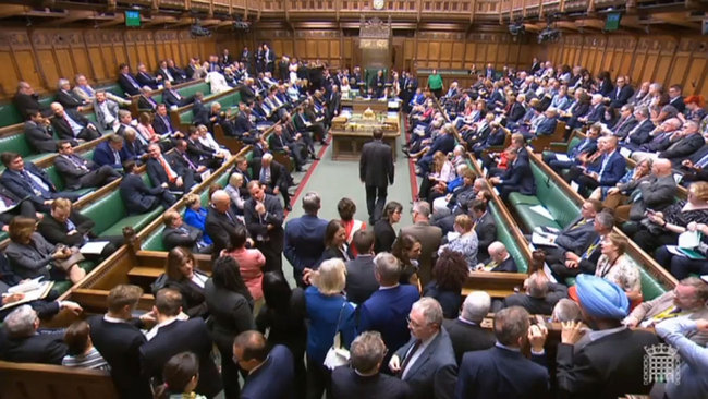 A grab from a handout video made available by the UK Parliamentary Recording Unit shows members of parliament convening for the announcement of voting on the 'Benn Amendment' in the British House of Commons at Westminster, London, Britain, July 18, 2019. The Benn Amendment is aimed at preventing the next prime minister from suspending Parliament to pursue a no-deal Brexit. [Photo: EPA/UK Parliamentary Recording Unit Handout via IC]