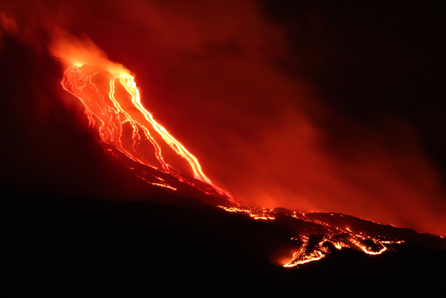 Mt. Etna continues the lively Strombolian activity of the New South East Crater, which has generated a long lava flow, which flows from the valley of the Bove, on the east coast of Sicily, Italy, on Saturday, July 20, 2019. [Photo: IC]