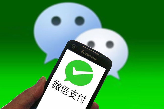 WeChat Pay has rolled out a pilot in-flight mobile payment service for passengers taking two flights carried by Spring Airlines. [File photo: VCG]