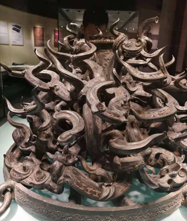 Bronze base of the Jiangu drum, an accessory used to support the column and fix the drum. [Photo: China Plus/ Wang Xiaoyu]