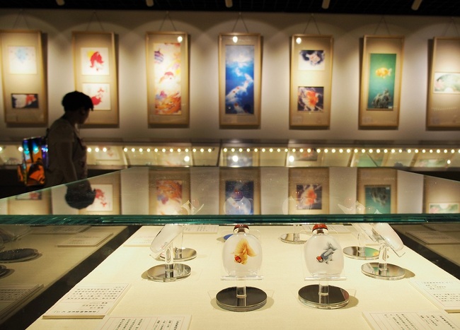 An exhibition showcasing live goldfish and goldfish-themed cultural relics kicks off in the Forbidden City on Tuesday, Beijing, China, July 30, 2019. [Photo: VCG]