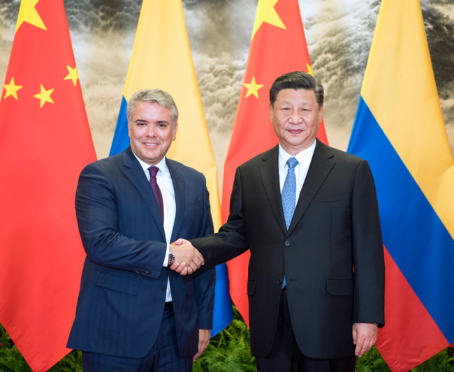 Chinese President Xi Jinping (R) holds talks with visiting Colombian President Ivan Duque Marquez at the Great Hall of the People in Beijing, capital of China, July 31, 2019. [Photo: Xinhua/Li Xueren]