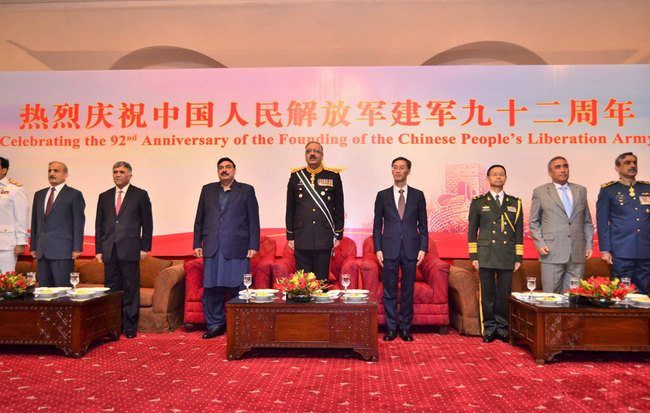 Chairman Joint Chiefs of Staff Committee of Pakistan, General Zubair Mahmood Hayat(C), and Chinese ambassador to Pakistan, Yao Jing(next right) and other guests pose for a photo at an event celebrating the PLA Day in Islamabad, July 22, 2019. [Photo: China Plus/Muhammad Khan]