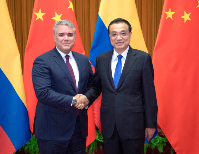Chinese Premier Li Keqiang meets with visiting Colombian President Ivan Duque Marquez on July 31, 2019. [Photo: Xinhua]