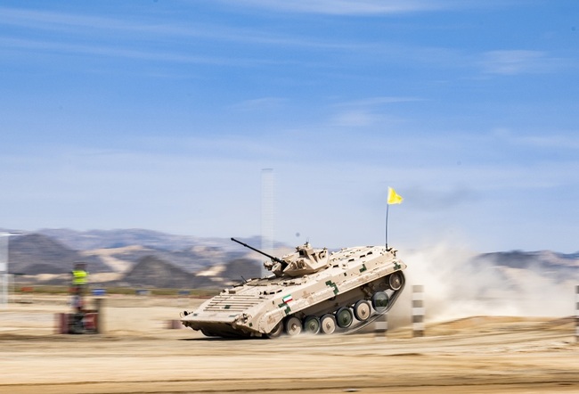 A Chinese 86A Infantry Fighting Vehicle is seen during the "Suvorov Attack" contest of the International Army Games 2019 in Korla City in Xinjiang Uygur Autonomous Region, China,on August 4, 2019. A total of 24 teams from 12 countries will take part in four competitions of the International Army Games 2019 hosted by China. [Photo: The Beijing News via IC]