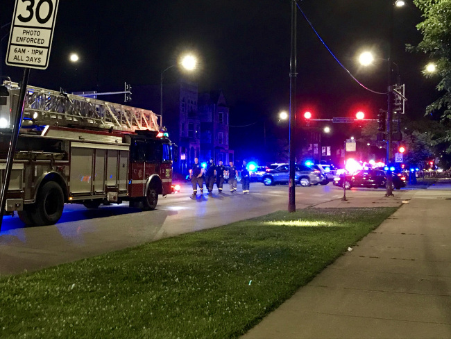 Chicago Fire Department paramedics respond to a shooting in the 2900 block of West Roosevelt Road, when seven people were wounded by gunfire around 1:20 a.m. in Douglas Park in Chicago, Ill, August 4, 2019. [File Photo: IC/ZUMA Wire]