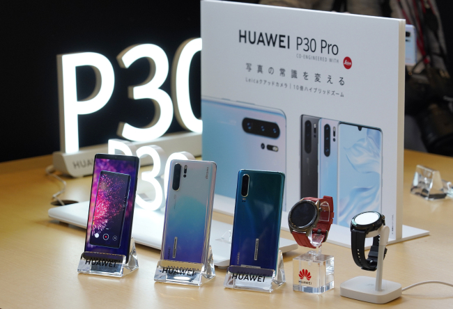 New Huawei products on display at a promotional event in Tokyo, Japan, on May 21, 2019. [File Photo: Jiji Press via VCG/Morio Taga]